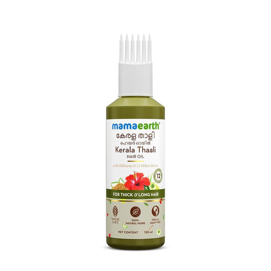 Mamaearth Kerala Thaali hair oil bottle on a white background